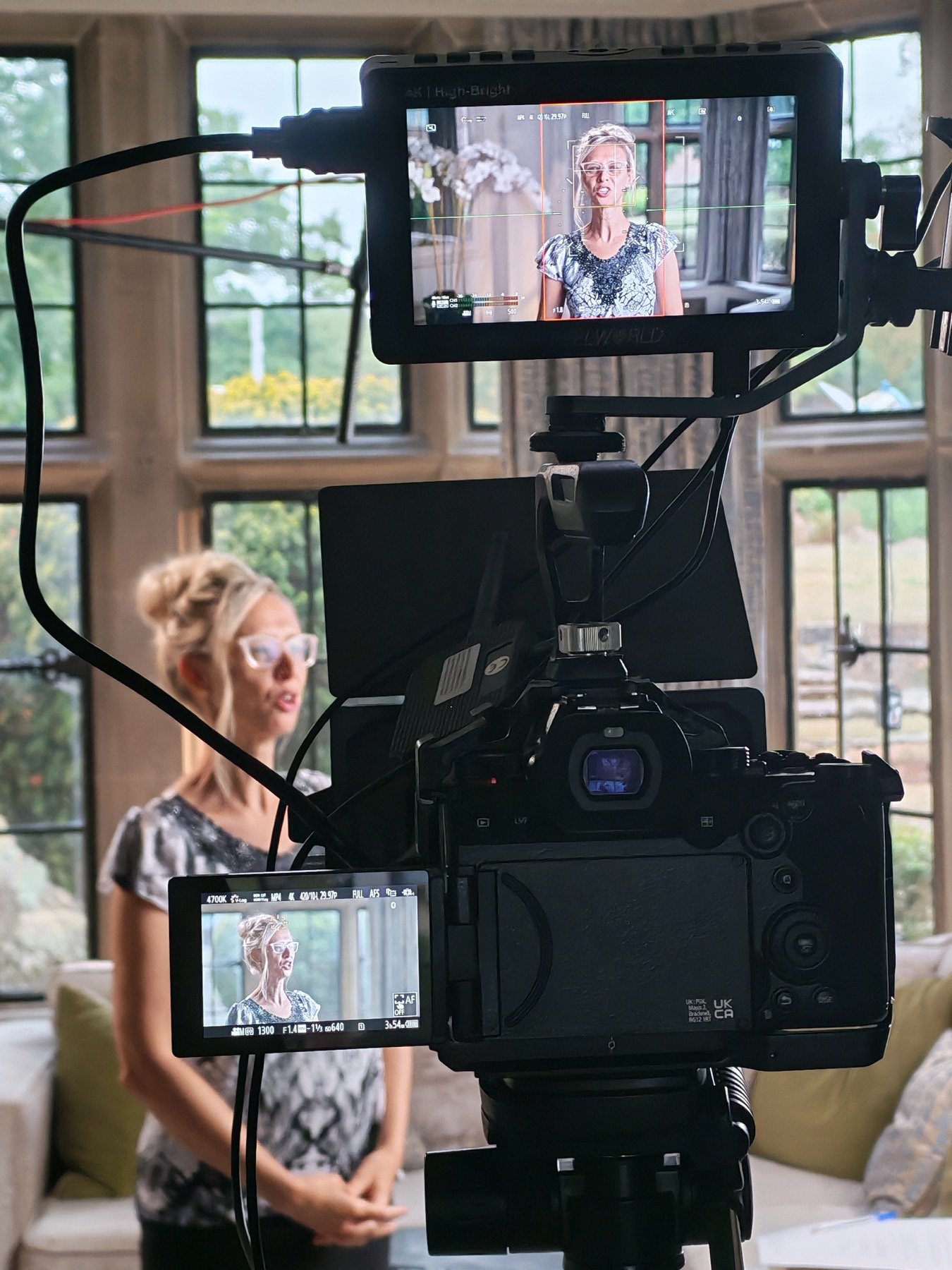Camera screen showing a filmed Newbold Connect session